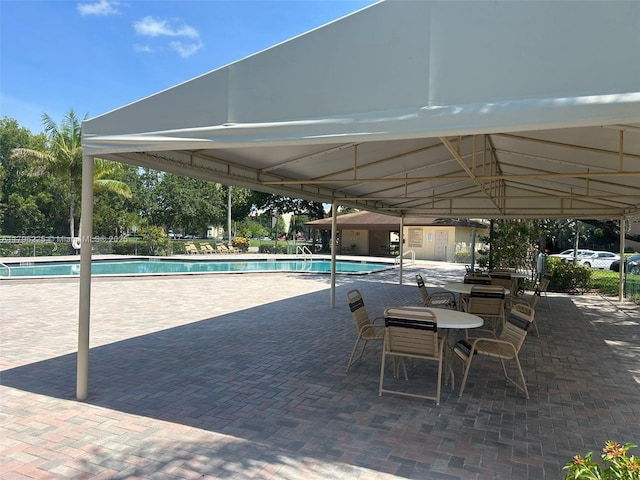 850 SW 133rd Ter Unit 312B, Pembroke Pines, FL 33027 - community pool with a patio