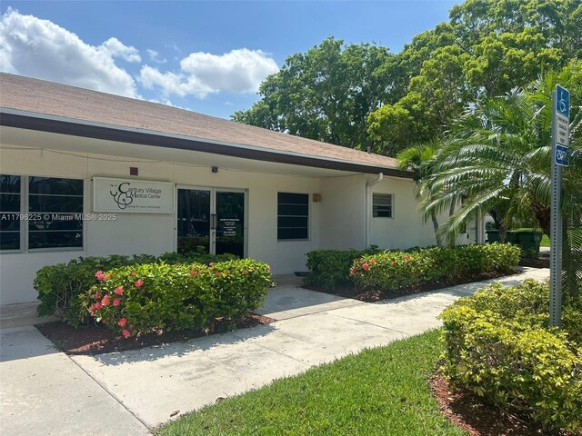850 SW 133rd Ter Unit 312B, Pembroke Pines, FL 33027 - property entrance with stucco siding