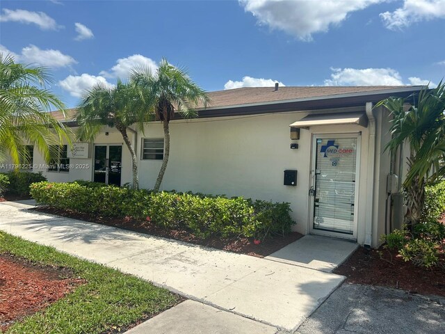 850 SW 133rd Ter Unit 312B, Pembroke Pines, FL 33027 - property entrance with stucco siding
