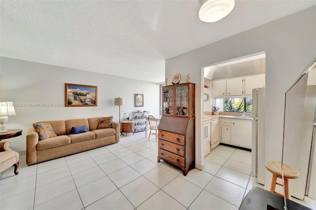 living area featuring light tile patterned floors