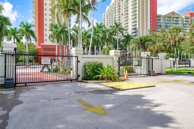 view of gate featuring fence