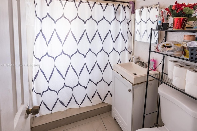 full bathroom with vanity, tile patterned floors, curtained shower, and toilet