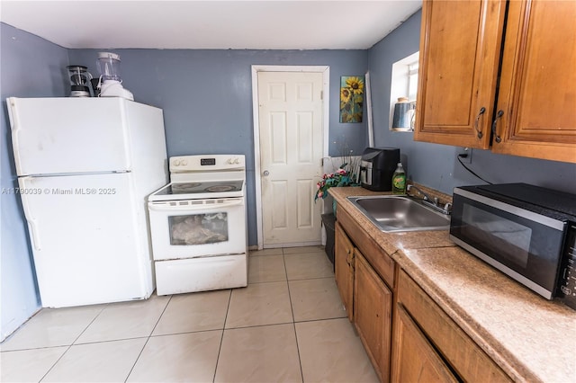kitchen featuring brown cabinetry, a sink, light tile patterned floors, light countertops, and white appliances