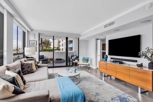 living room featuring visible vents
