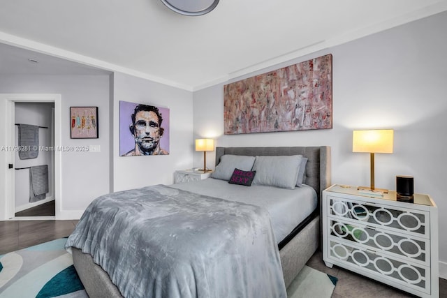 bedroom with baseboards and tile patterned flooring