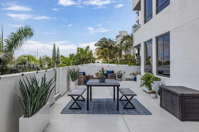 view of patio featuring outdoor dining area