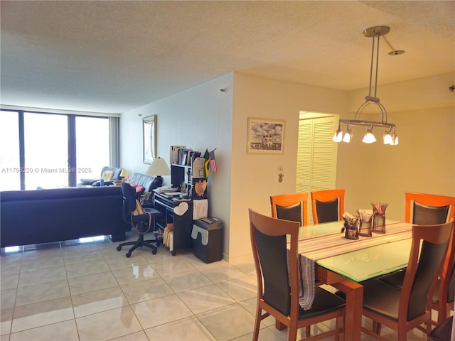 dining area with a textured ceiling