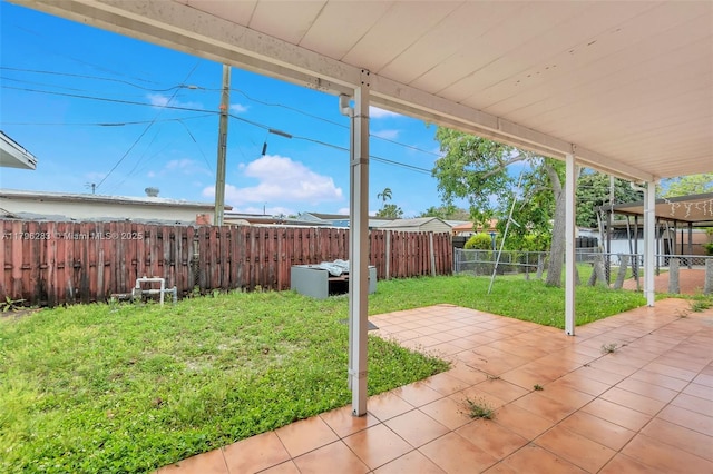 view of yard with a patio and a fenced backyard