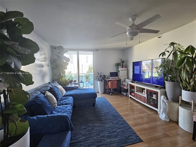 1035 W Ave Unit 406, Miami Beach, FL 33139 - living area featuring wood finished floors, a ceiling fan, and an office area