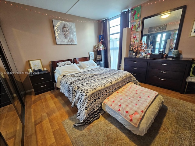 1035 W Ave Unit 406, Miami Beach, FL 33139 - bedroom with wood finished floors