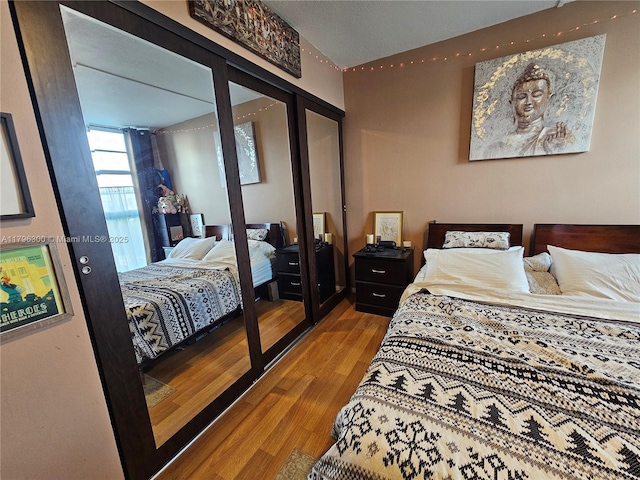 1035 W Ave Unit 406, Miami Beach, FL 33139 - bedroom featuring wood finished floors
