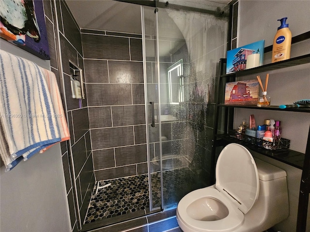 1035 W Ave Unit 406, Miami Beach, FL 33139 - bathroom with a stall shower and toilet