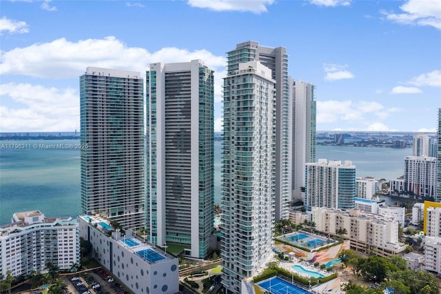view of property featuring a view of city and a water view