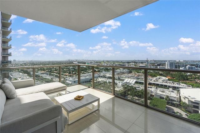 balcony featuring a view of city and an outdoor living space