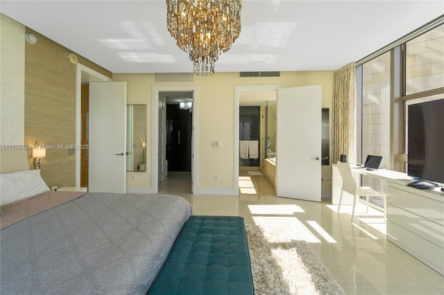 bedroom with visible vents, baseboards, ensuite bathroom, tile patterned floors, and a chandelier