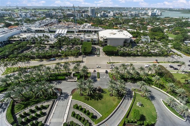 drone / aerial view with a view of city and a water view