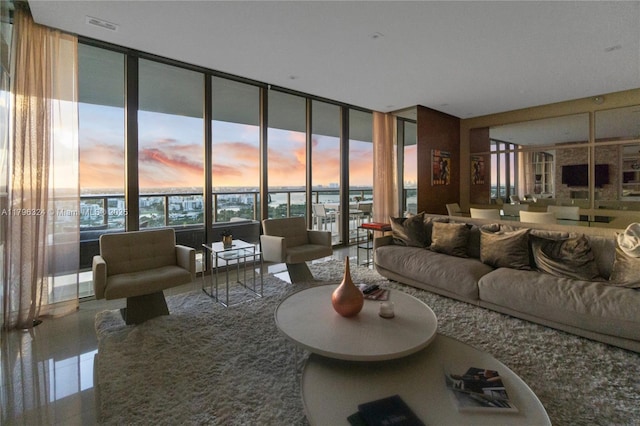 living room with a wall of windows