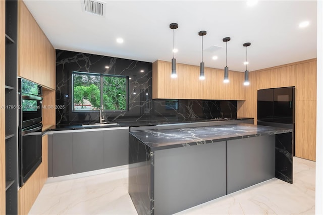 kitchen with a sink, decorative backsplash, marble finish floor, and modern cabinets