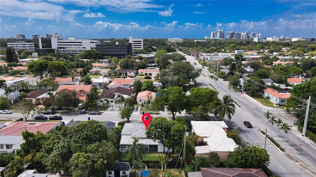birds eye view of property with a city view