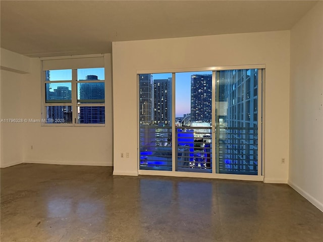 133 NE 2nd Ave Unit 1905, Miami, FL 33132 - unfurnished room with concrete flooring and a view of city