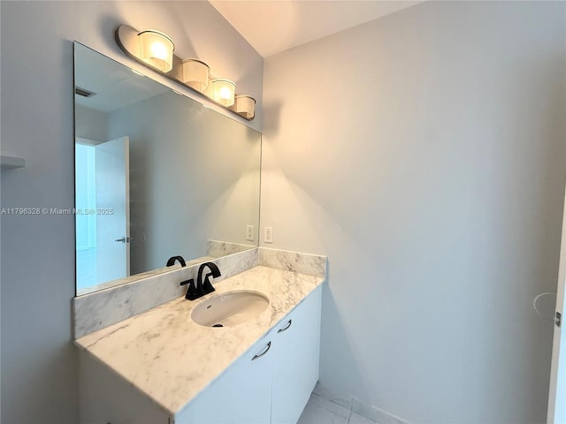 133 NE 2nd Ave Unit 1905, Miami, FL 33132 - bathroom with vanity and tile patterned floors