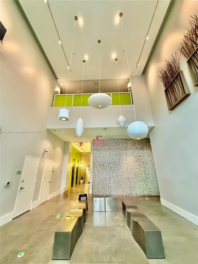133 NE 2nd Ave Unit 1905, Miami, FL 33132 - reception area with a towering ceiling