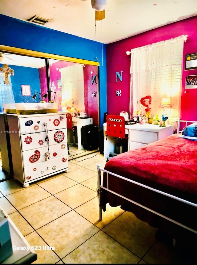 5706 Simms St, Hollywood, FL 33021 - bedroom featuring tile patterned floors and a closet