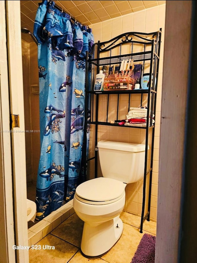 5706 Simms St, Hollywood, FL 33021 - full bathroom with toilet, tile patterned floors, and a shower with shower curtain