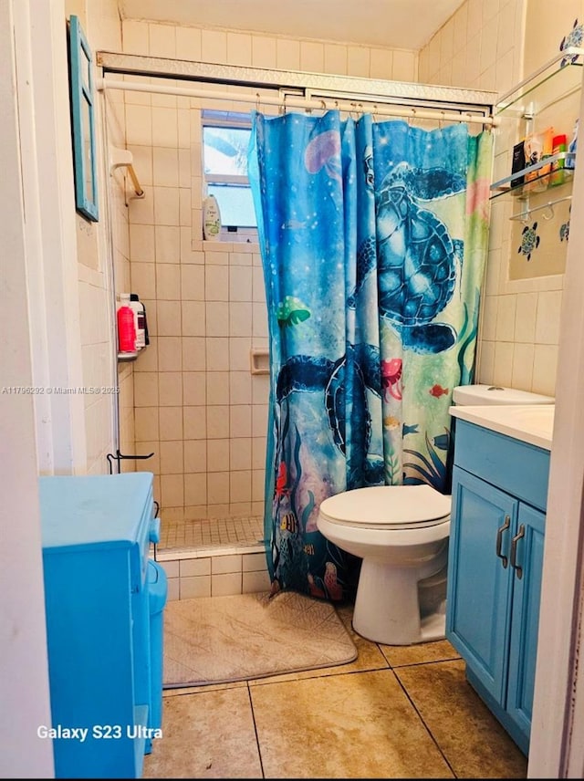 5706 Simms St, Hollywood, FL 33021 - full bathroom featuring vanity, a stall shower, tile patterned flooring, and tile walls