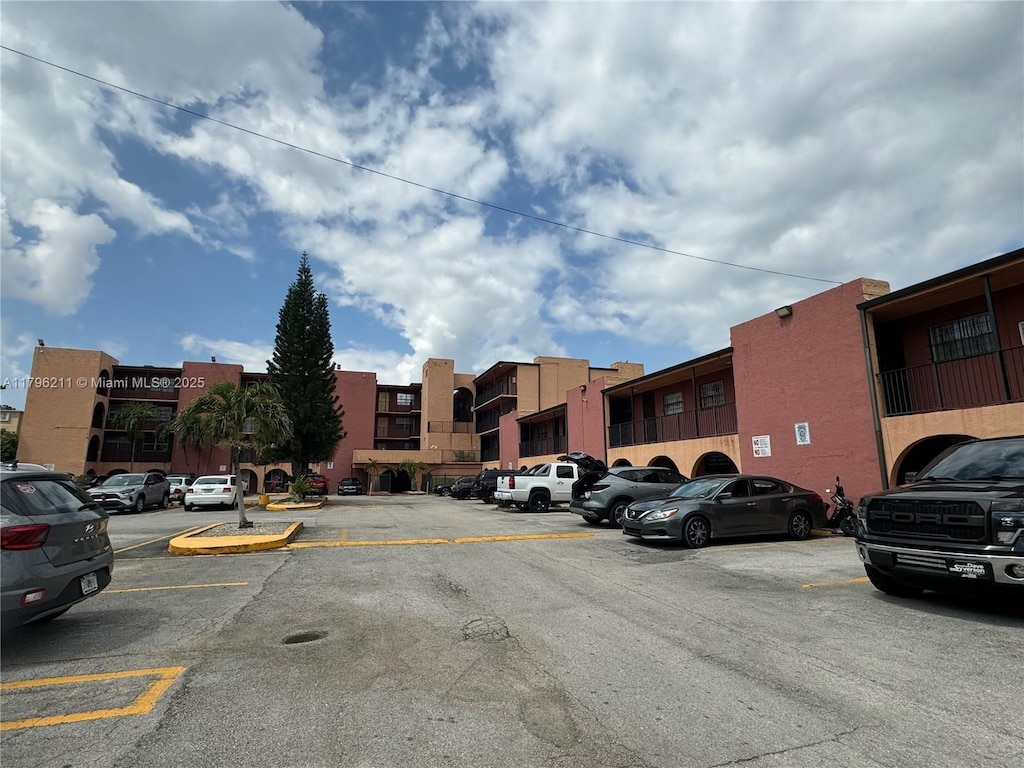 6620 W 2nd Ct Unit 407, Hialeah, FL 33012 - view of uncovered parking lot
