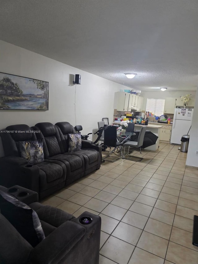 6215 W 22nd Ct Unit 15, Hialeah, FL 33016 - living room featuring light tile patterned floors and a textured ceiling