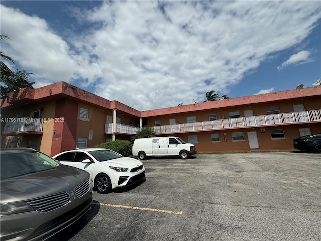 1245 W 24th St Unit 121, Hialeah, FL 33010 - view of uncovered parking lot