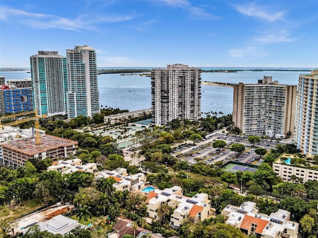 bird's eye view featuring a view of city and a water view