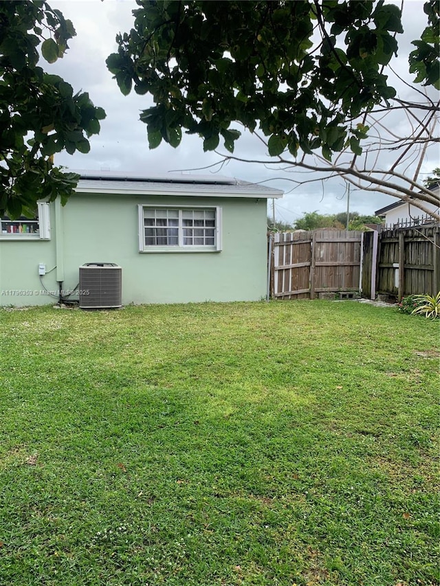 17200 N Miami Ave, Miami, FL 33169 - view of yard featuring central air condition unit and fence
