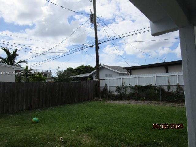 view of yard featuring fence