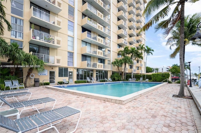 2350 NE 135th St Unit 510, North Miami, FL 33181 - community pool featuring a patio area