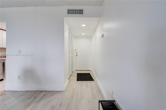 2350 NE 135th St Unit 510, North Miami, FL 33181 - corridor featuring light wood finished floors and recessed lighting