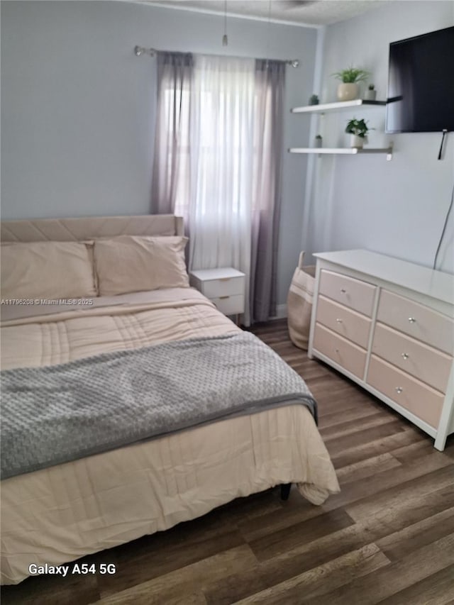 423 SW 80th Ave, North Lauderdale, FL 33068 - bedroom featuring dark wood-type flooring