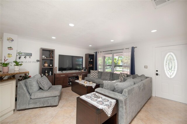 717 E River Dr, Margate, FL 33063 - living area featuring light tile patterned floors and recessed lighting