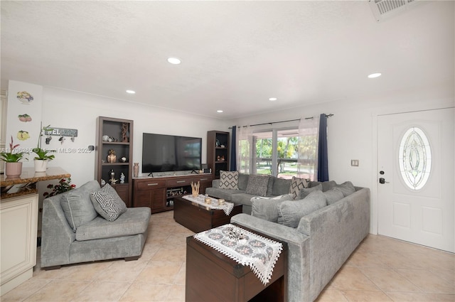 717 E River Dr, Margate, FL 33063 - living area featuring light tile patterned floors and recessed lighting