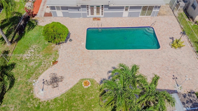 717 E River Dr, Margate, FL 33063 - view of subject property featuring a pool