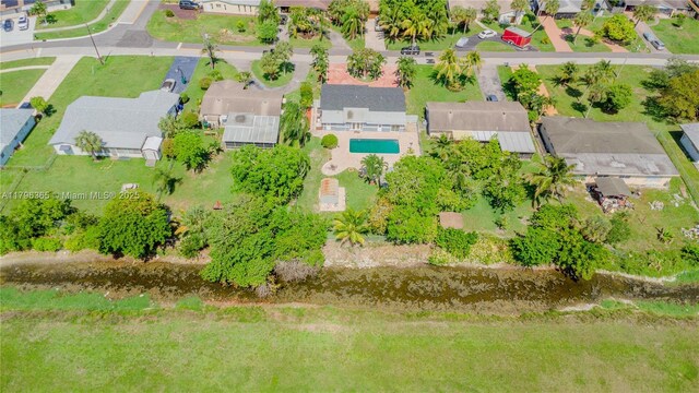 717 E River Dr, Margate, FL 33063 - aerial view of property's location with a pool and nearby suburban area