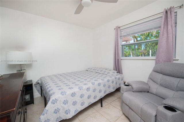 717 E River Dr, Margate, FL 33063 - bedroom with tile patterned flooring and ceiling fan