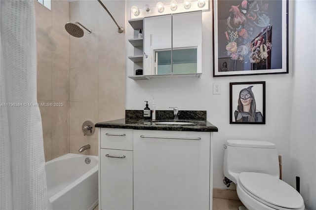 bathroom featuring toilet, shower / bath combo, and vanity