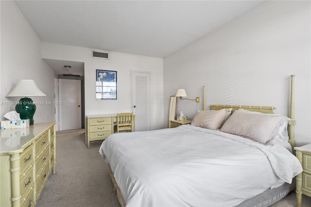 1980 S Ocean Dr Unit Mk, Hallandale Beach, FL 33009 - carpeted bedroom with a closet, a textured ceiling, and visible vents