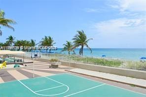 1980 S Ocean Dr Unit Mk, Hallandale Beach, FL 33009 - view of basketball court with community basketball court and a water view