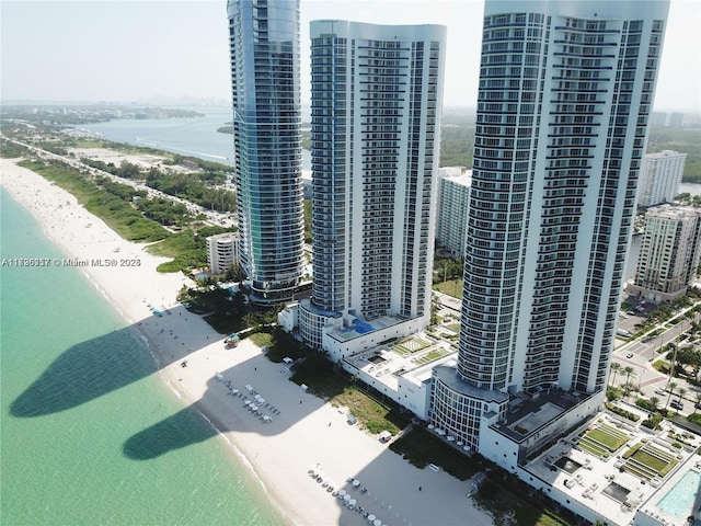 view of urban area with expansive coastline
