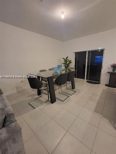dining room with light tile patterned floors