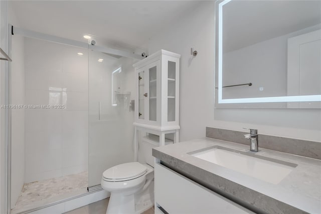 240 Galen Dr Unit 308, Key Biscayne, FL 33149 - bathroom featuring toilet, tiled shower, and vanity
