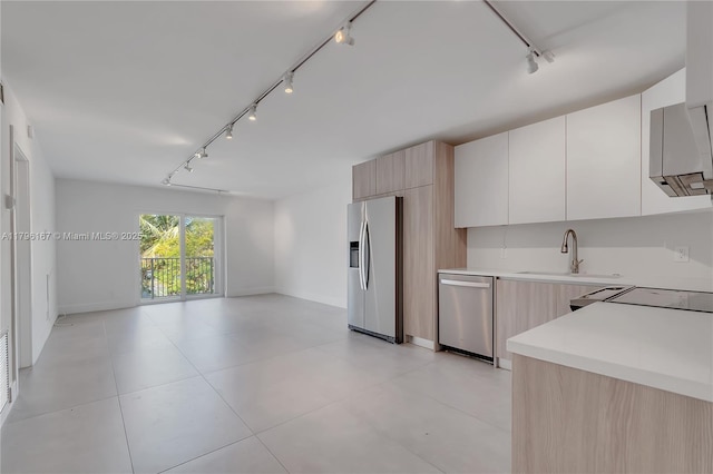 240 Galen Dr Unit 308, Key Biscayne, FL 33149 - kitchen featuring a sink, track lighting, light countertops, modern cabinets, and appliances with stainless steel finishes